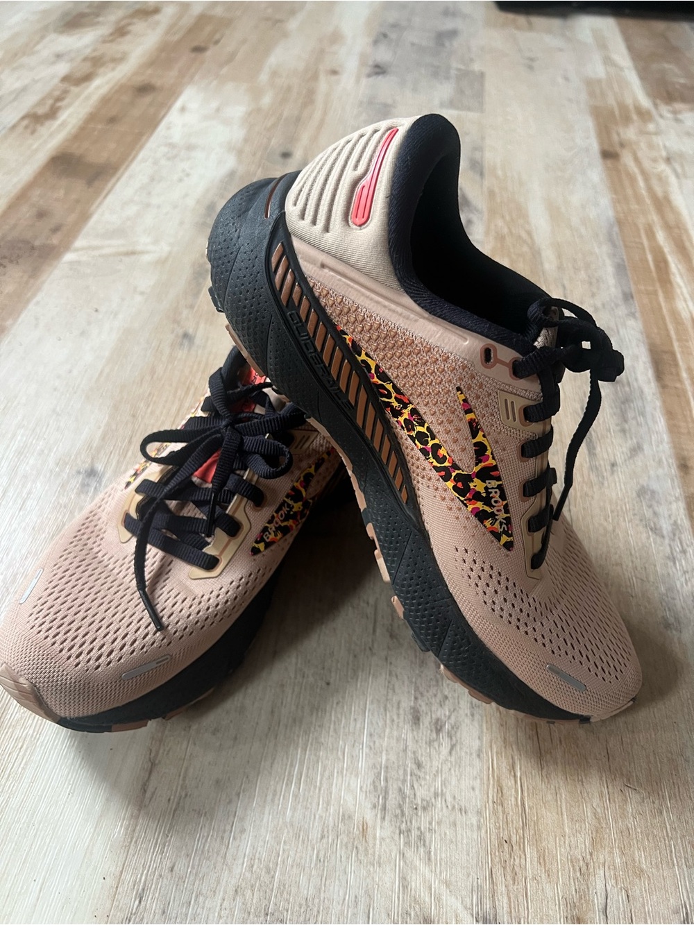 Brooks Black and Pink Running Shoes with Subtle Leopard Accent